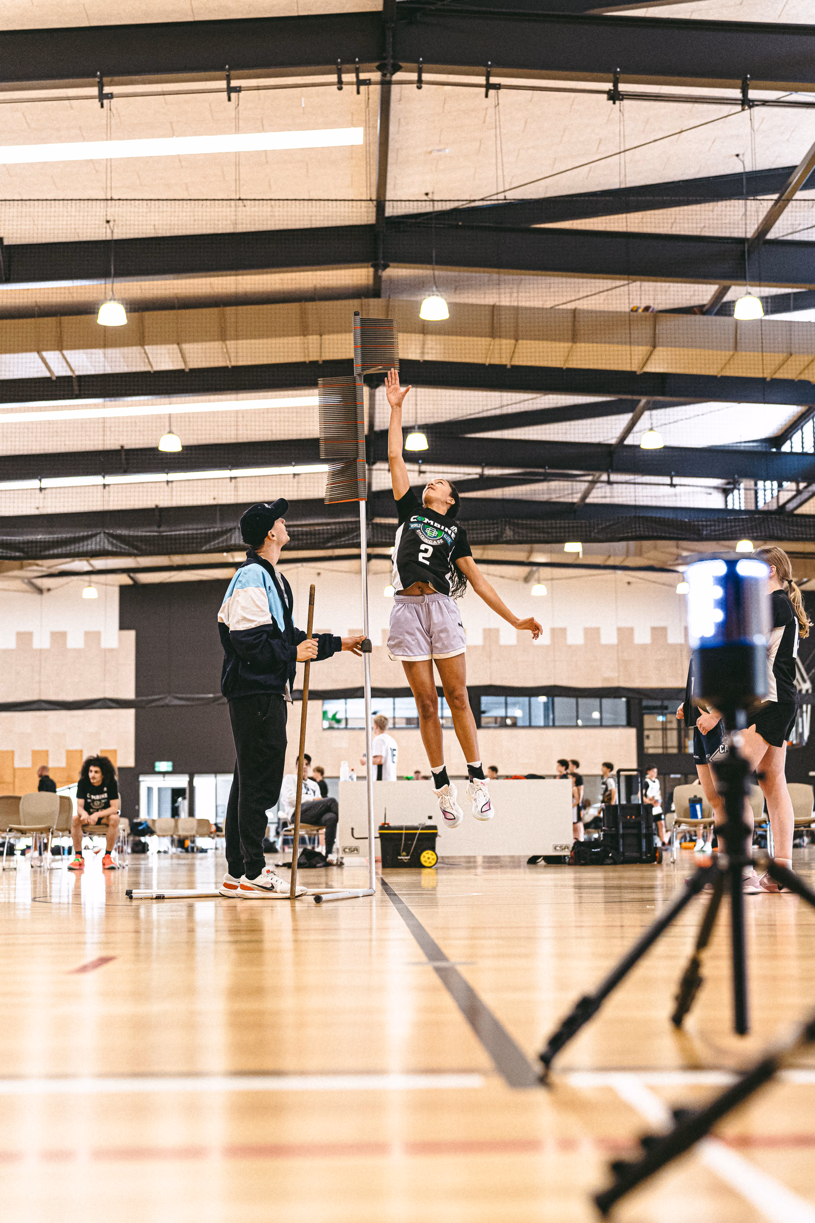 Athlete jumping in a vertical reach drill